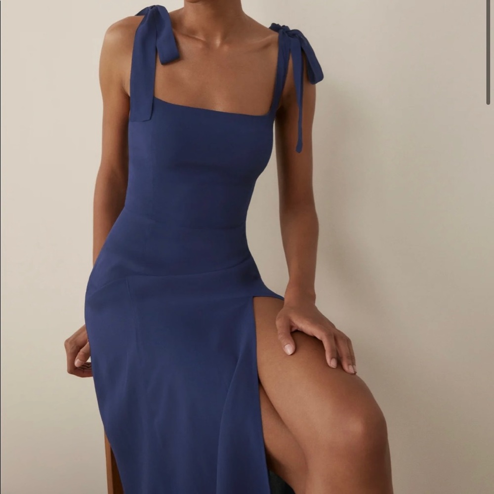 Beautiful deep blue dress from Reformation, tied straps and leg slit.